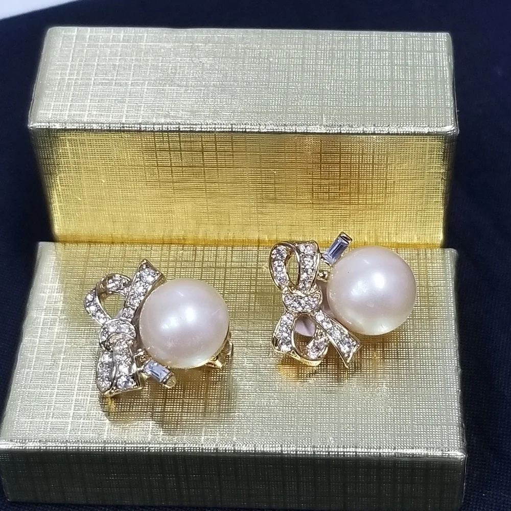 Vintage Nina Ricci  faux pearl clip on earrings